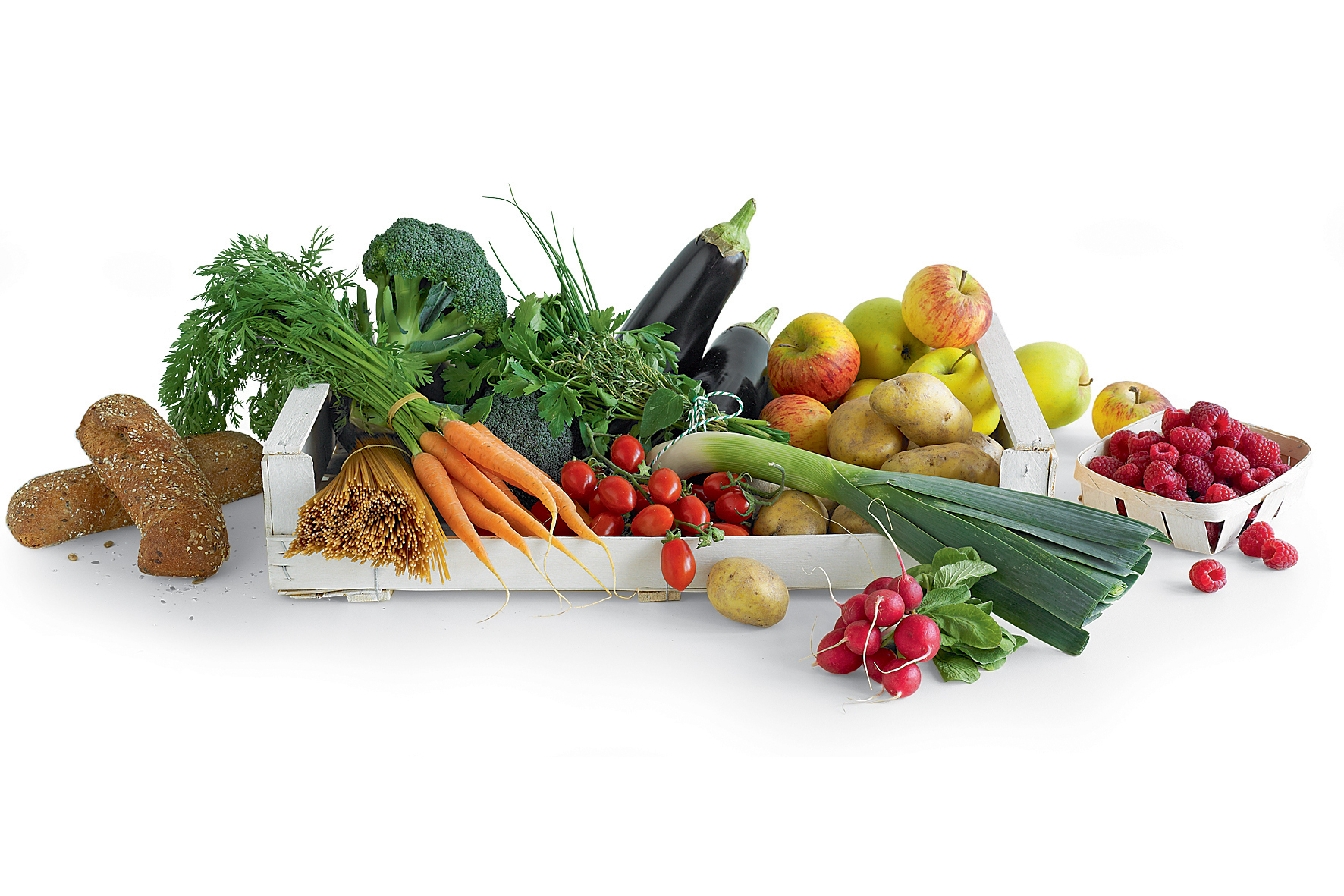 Légumes et Früchtearrengement dans une boîte en bois