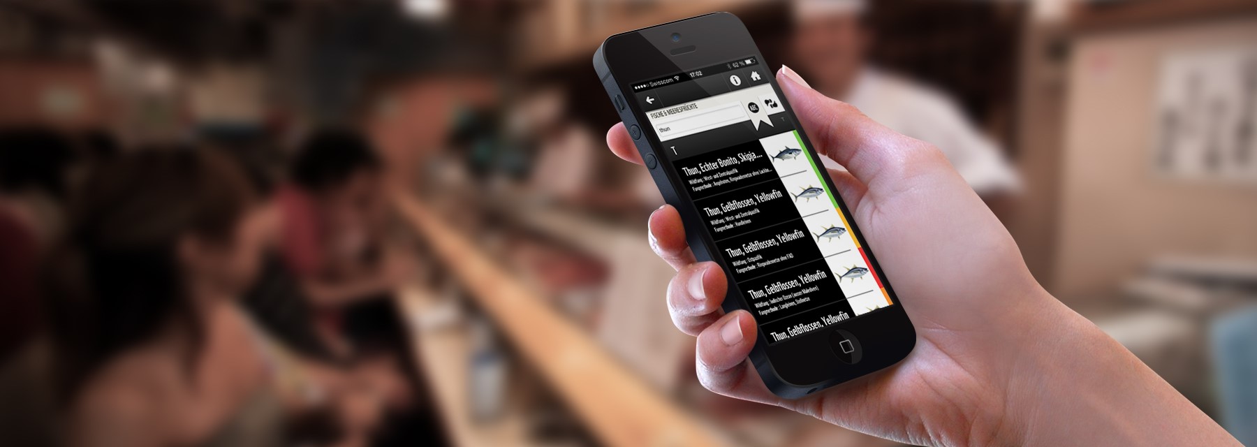Person holds smartphone with the open WWF Advisor App