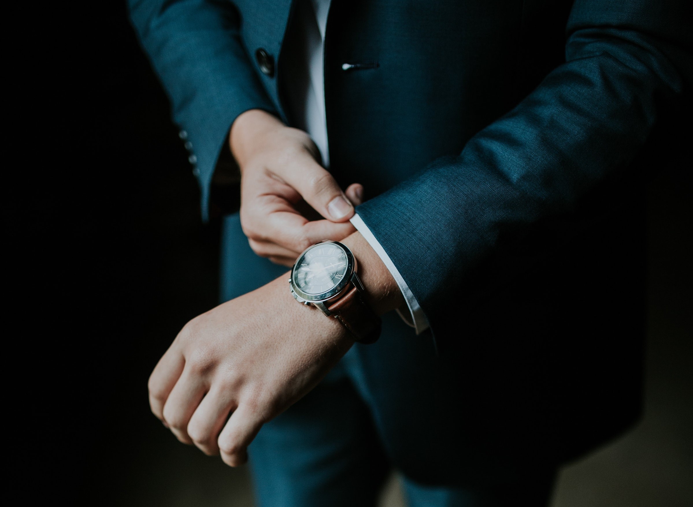 Mann mit Uhr