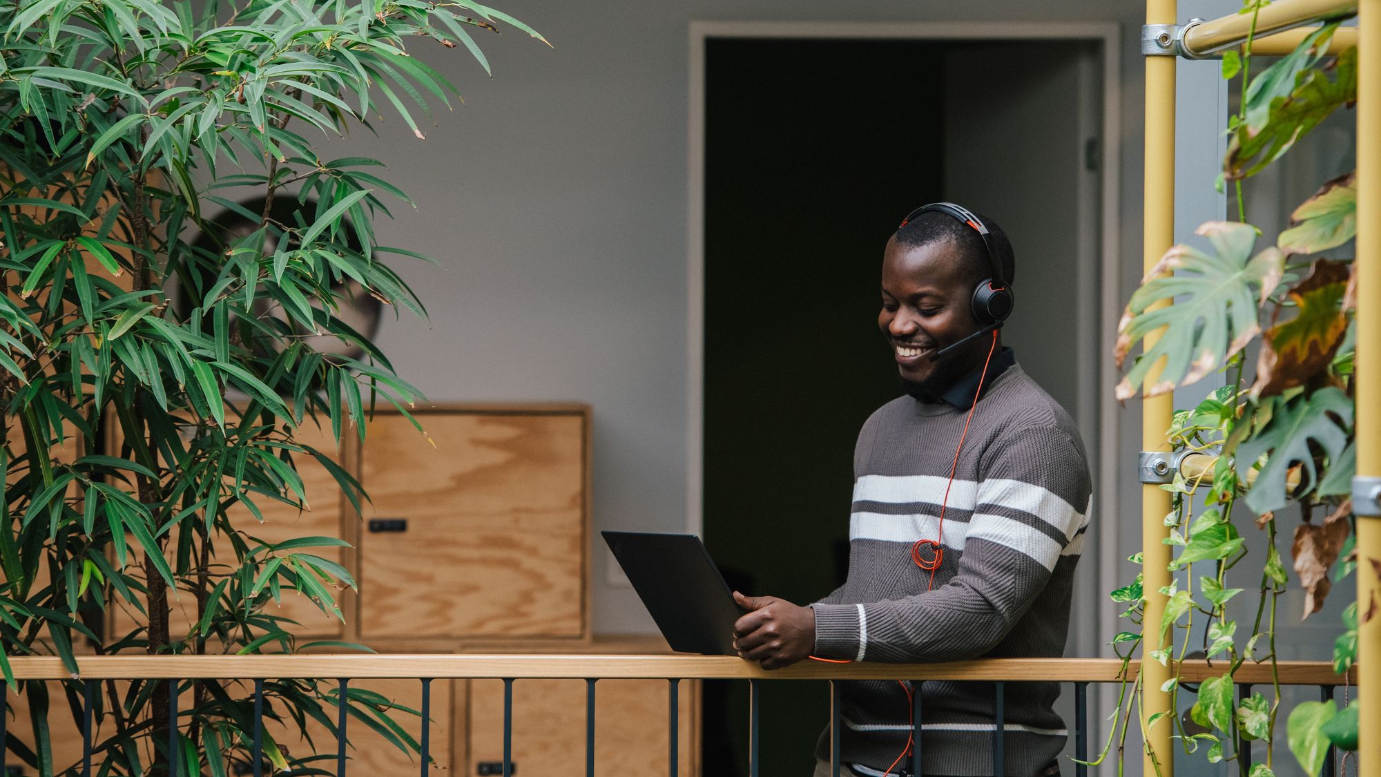 employee on a video call in open office space