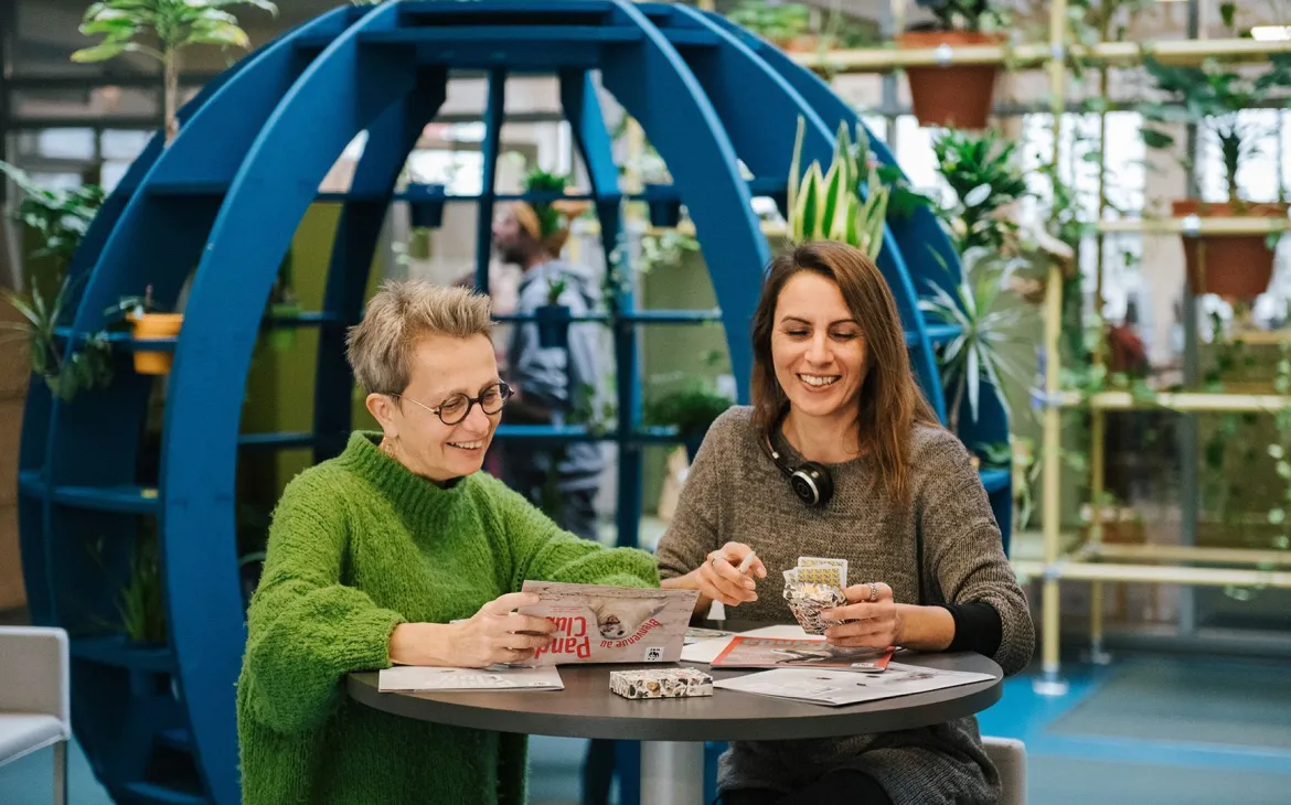 co workers in an open space office room