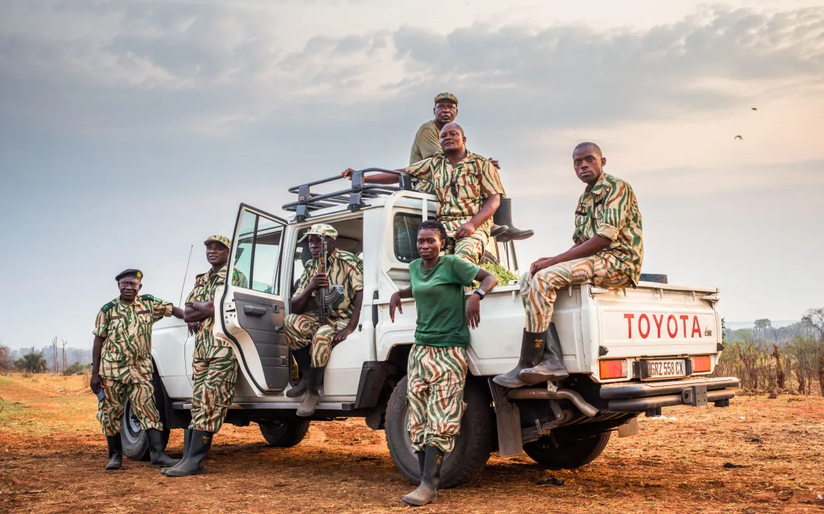 Protecting rhinos requires 24/7 monitoring, anti-poaching units, technology like cameras and drones, and collaboration with local communities to raise conservation awareness.