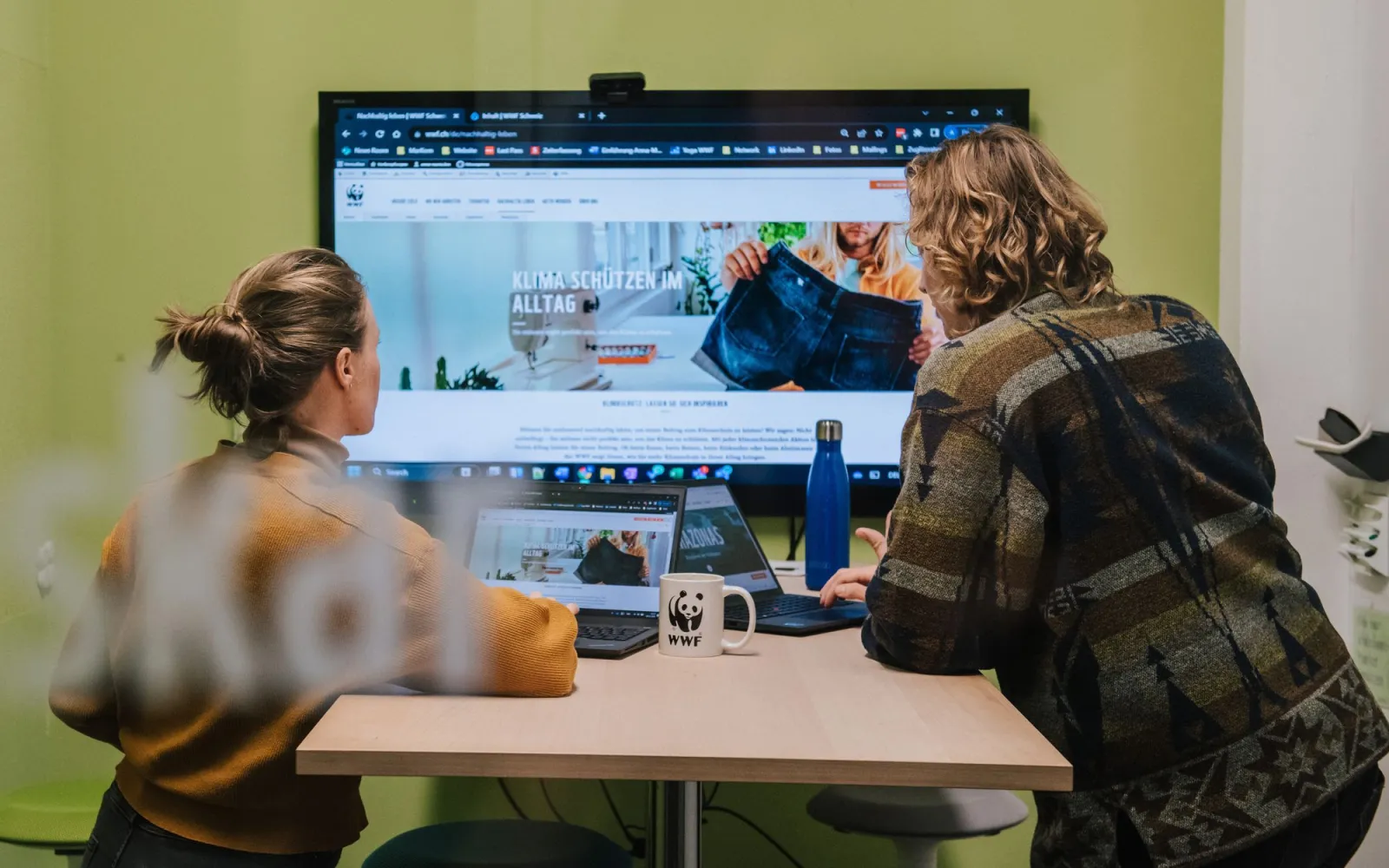 co-workers working in a meeting room