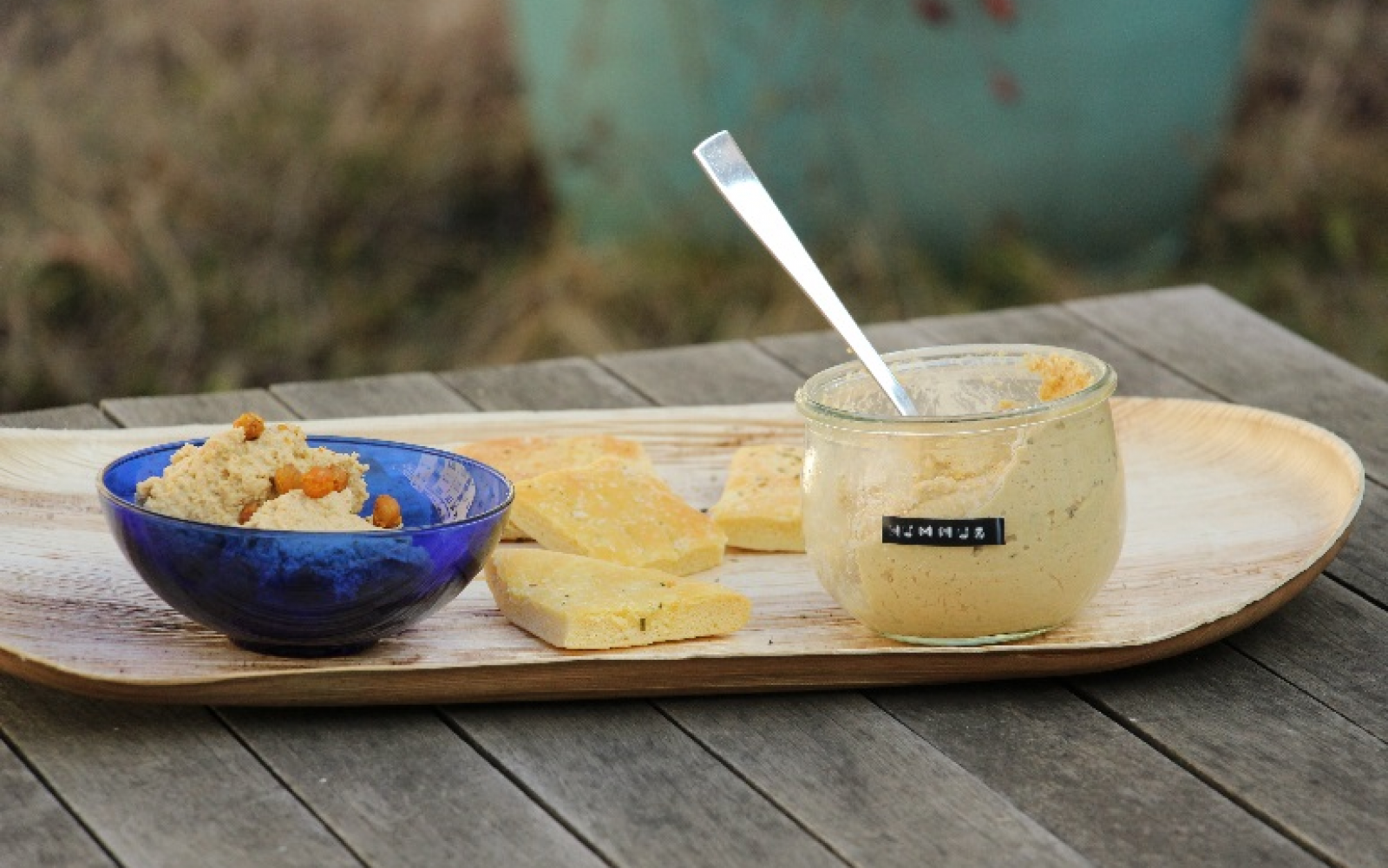 Table with hummus and bread