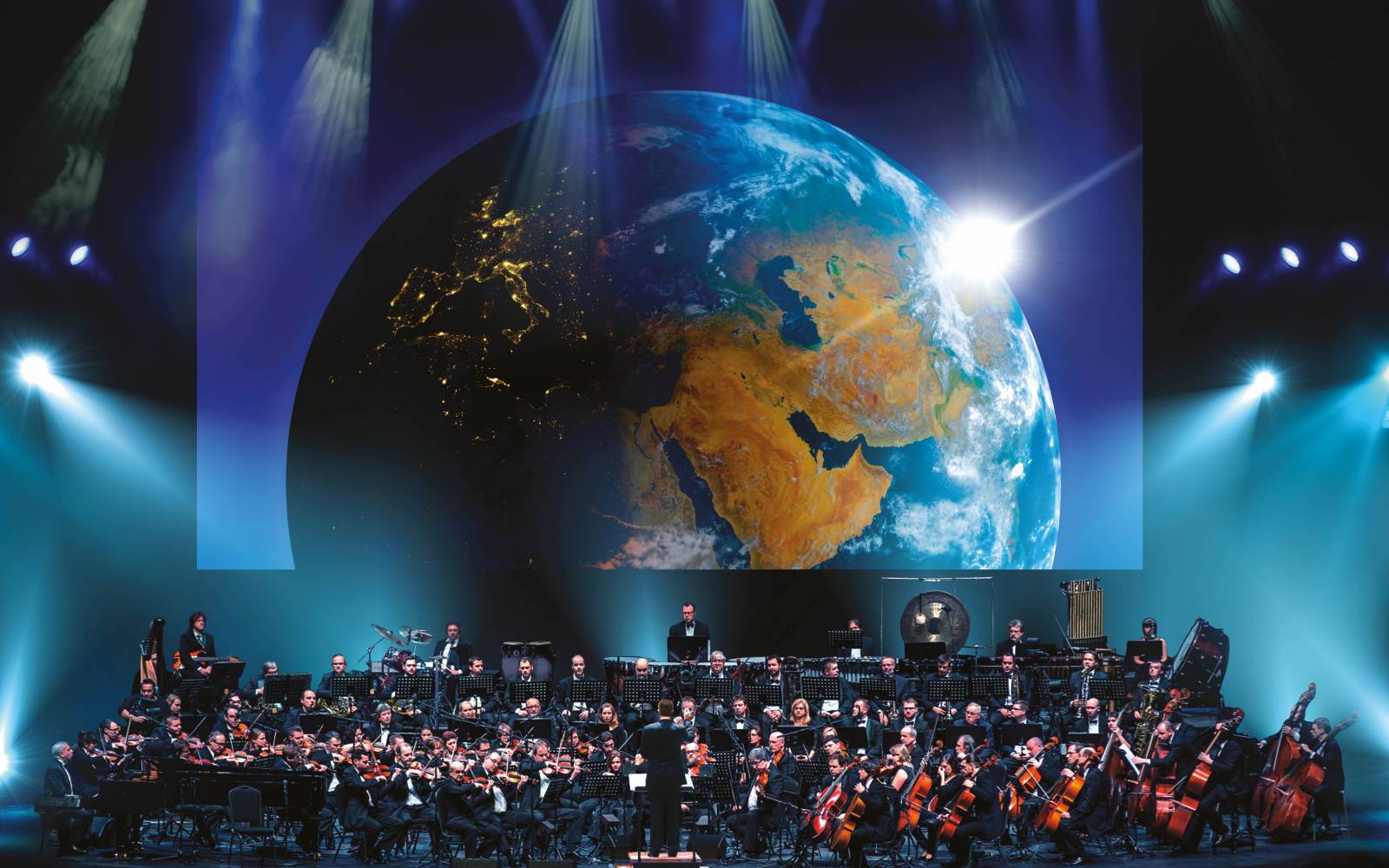orchestra playing the Our Planet Live Concert