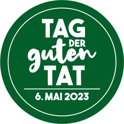 Logo der Aktion Tag der guten Tat mit Datum. Das runde Logo ist grün mit weissem Schriftzug.