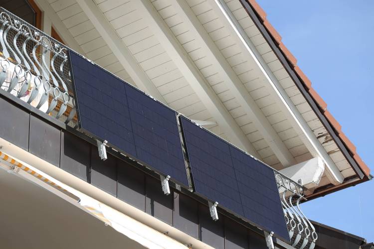 Single family house with balcony power plant
