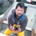 Patricio with mussels